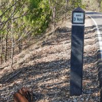 Echidna mascot at a distance sign on The Barossa Trail