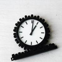 Clock at Disentis/Mustér railway station, replicating the cog wheel.