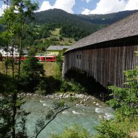 Covered bridge, with little red train