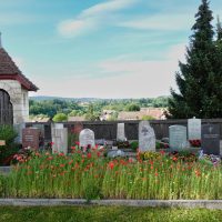 A section of cemetery with quirky headstones, Rheinau
