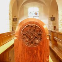 Pew in Abbatiale Sains Pierre et Paul, Ottmarsheim